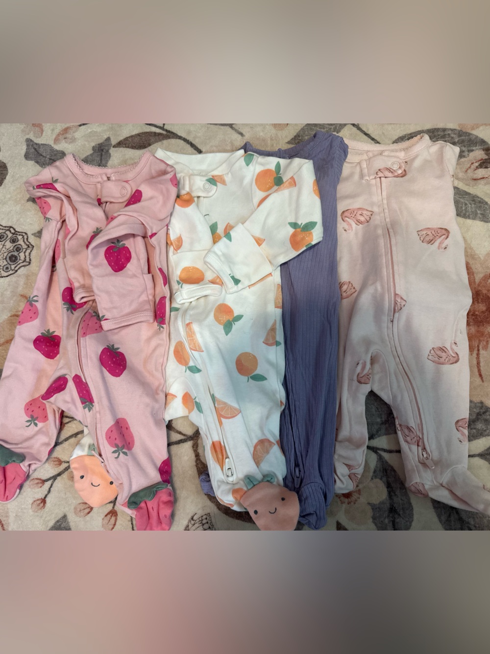 Bundle of carters newborn sleepers
